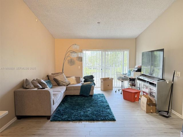 5015 Wiles Road 207, Coconut Creek, FL 33073