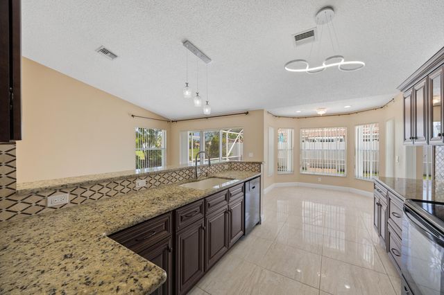 4720 NW 7th Street, Deerfield Beach, FL 33442