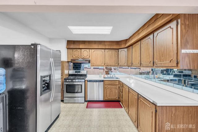 140 Camelot Drive, Port Reading, NJ 07064