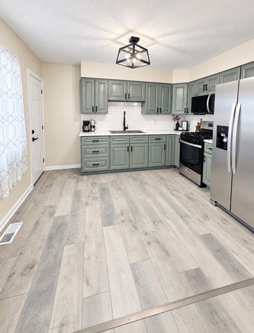 6745 Van Buren Place, Merrillville, IN 46410