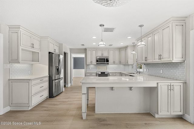 517 N River Oaks Drive, Indialantic, FL 32903