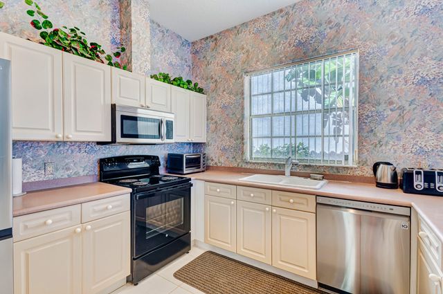 919 Augusta Pointe Drive, Palm Beach Gardens, FL 33418