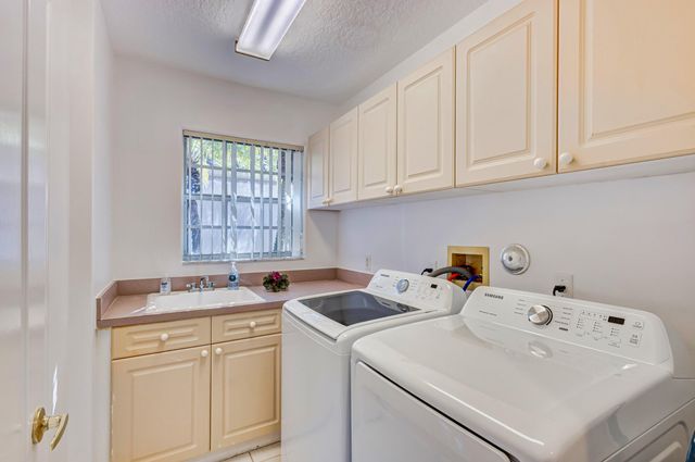 919 Augusta Pointe Drive, Palm Beach Gardens, FL 33418