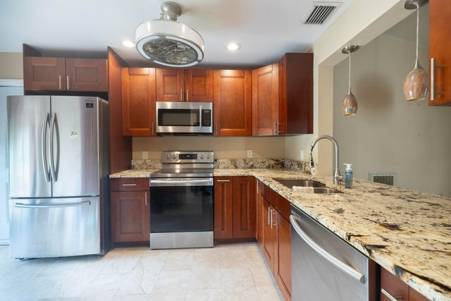 6149 Olivewood Circle, Greenacres, FL 33463