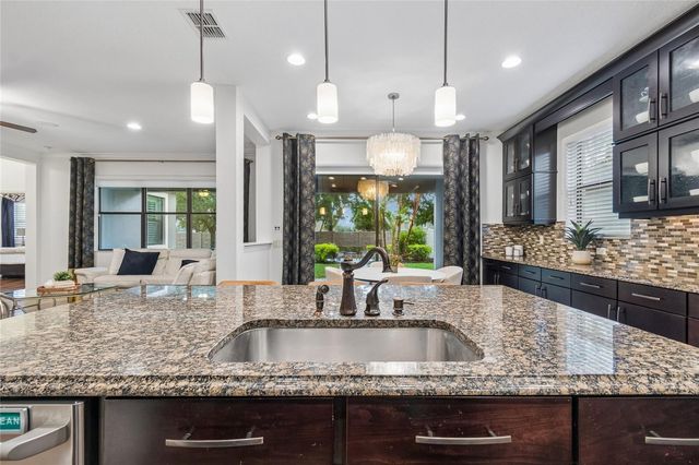 1657 FEATHER GRASS LOOP, Lutz, FL 33558