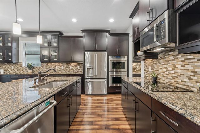 1657 FEATHER GRASS LOOP, Lutz, FL 33558