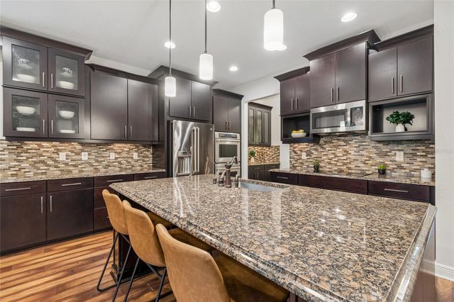 1657 FEATHER GRASS LOOP, Lutz, FL 33558