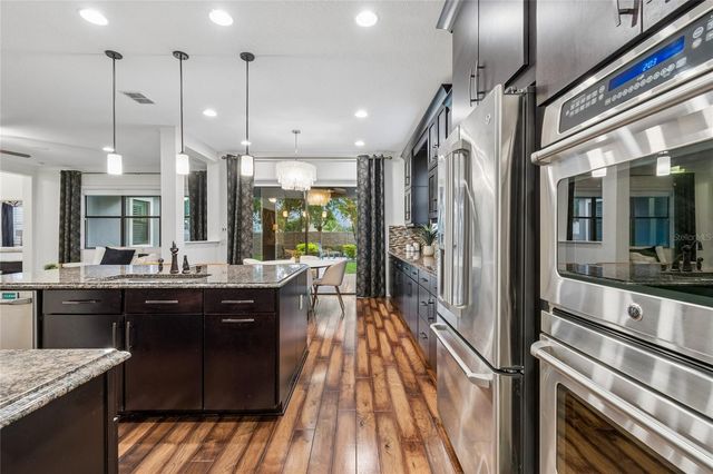 1657 FEATHER GRASS LOOP, Lutz, FL 33558