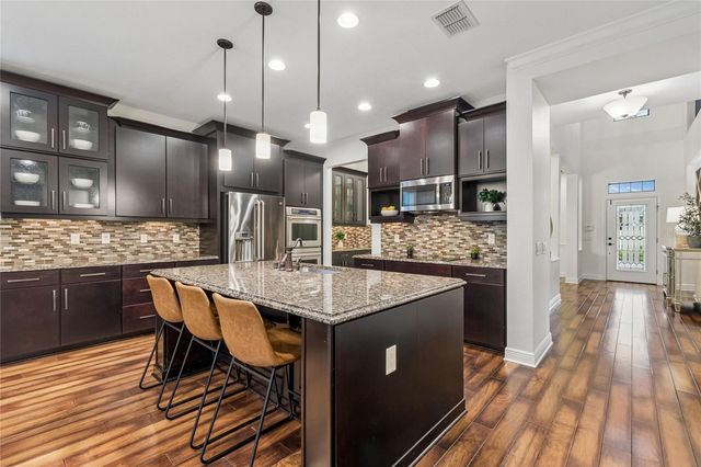 1657 FEATHER GRASS LOOP, Lutz, FL 33558
