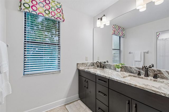 1657 FEATHER GRASS LOOP, Lutz, FL 33558