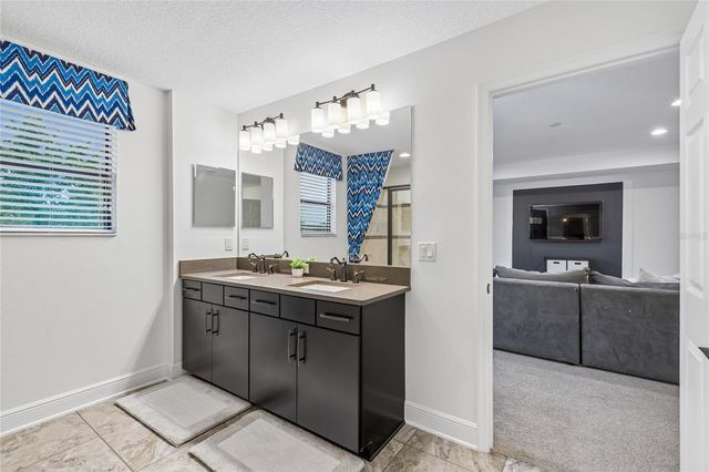 1657 FEATHER GRASS LOOP, Lutz, FL 33558