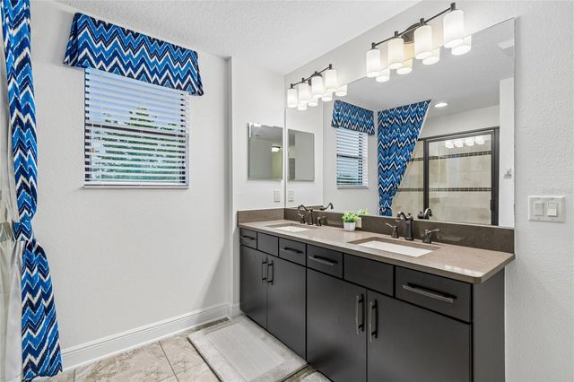 1657 FEATHER GRASS LOOP, Lutz, FL 33558