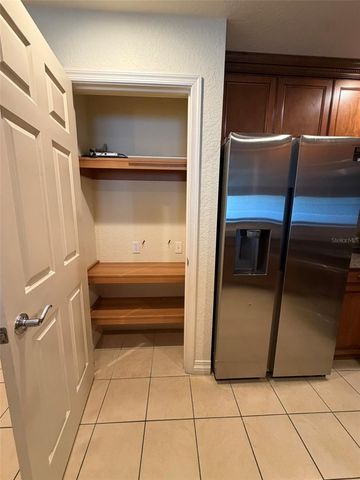 7656 WHISPER WAY 401, Reunion, FL 34747