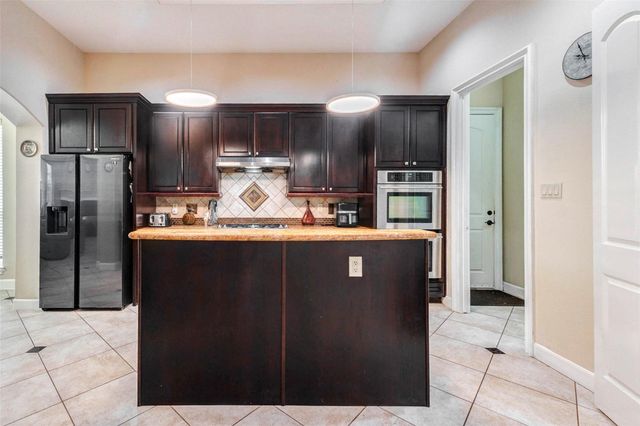 9003 Knightwood Court, Richmond, TX 77469