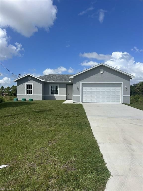 425 Mercedes CT, LEHIGH ACRES, FL 33972 — exterior