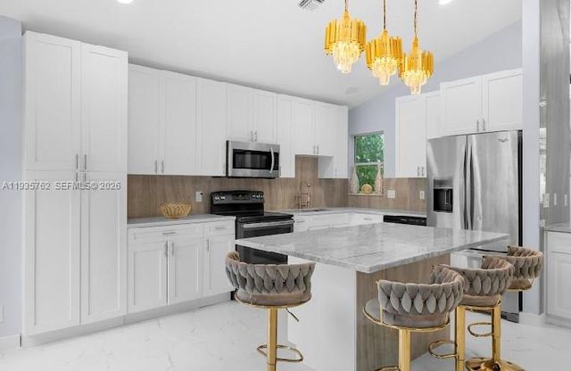 2002 Lake Breeze Court, Wellington, FL 33414