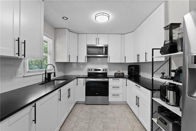 13205 Overhill Road, Grandview, MO 64030