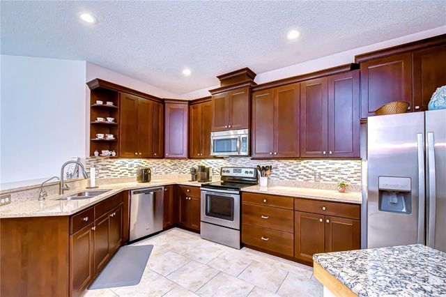 9815 GINGERWOOD DRIVE, Tampa, FL 33626