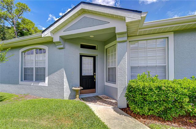 9815 GINGERWOOD DRIVE, Tampa, FL 33626