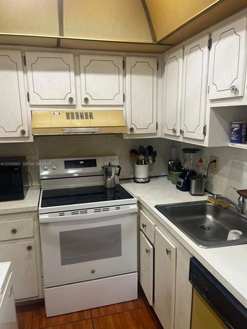 4990 E Sabal Palm Boulevard 218, Tamarac, FL 33319