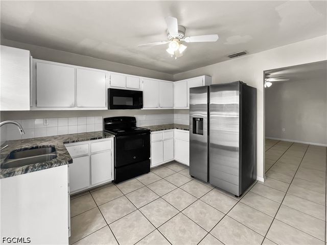 2704 Owen AVE, Lehigh Acres, FL 33973