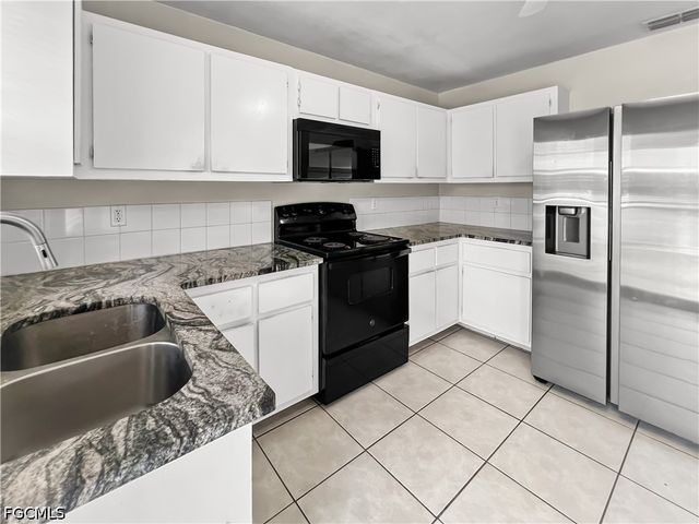 2704 Owen AVE, Lehigh Acres, FL 33973