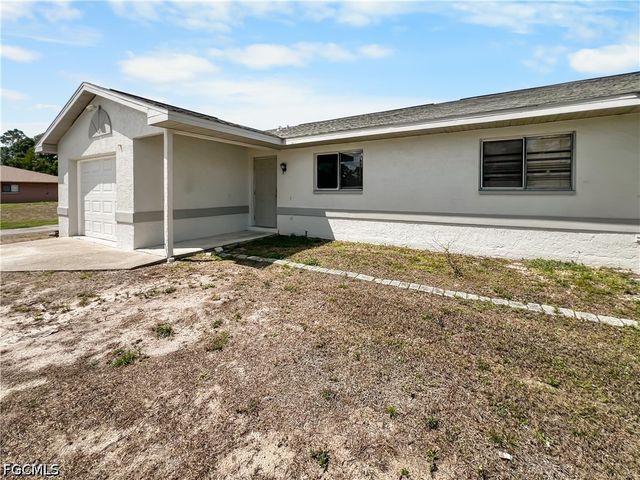 2704 Owen AVE, Lehigh Acres, FL 33973