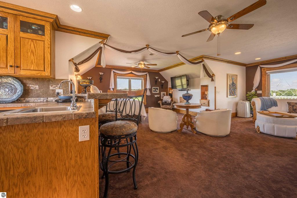 Image 48 of property listing at 9644 E Deerfield Road, Shepherd, MI 48883