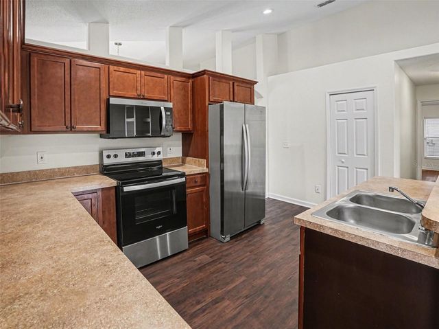 6673 BOUGANVILLEA CRESCENT DRIVE, Orlando, FL 32809