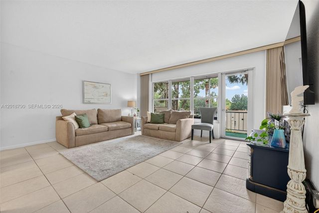 10777 W Sample Rd 209, Coral Springs, FL 33065