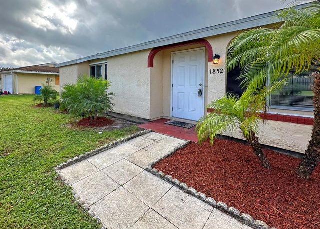 1852 SE Rainier Road, Port St Lucie, FL 34952