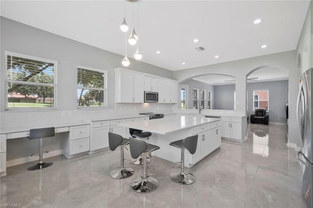 1711 Sarazen PL, Naples, FL 34120