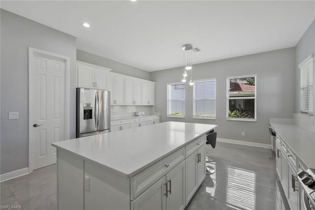 1711 Sarazen PL, Naples, FL 34120