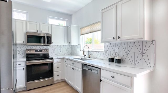 15437 W DOMINGO Lane, Sun City West, AZ 85375