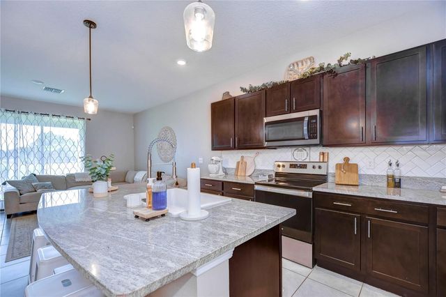 34240 REDWOOD DAWN LANE, Wesley Chapel, FL 33543