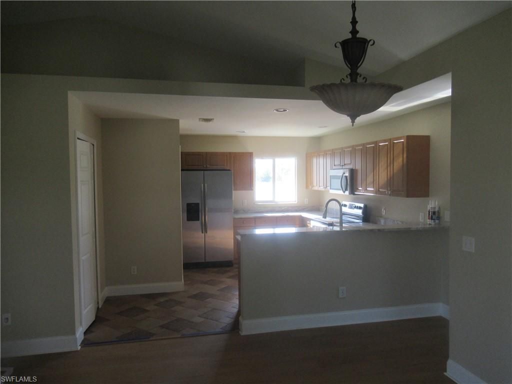 1622 NE 33rd TER, CAPE CORAL, FL 33909 — photo 4