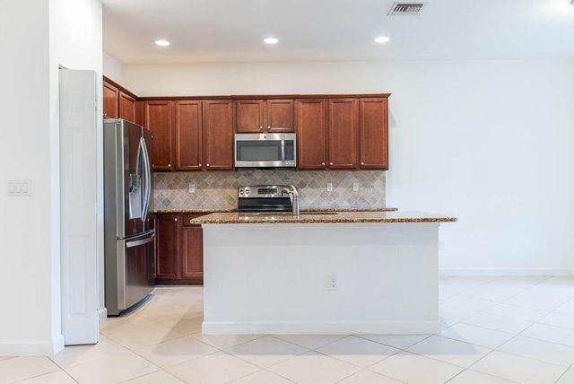 10283 Wellington Parc Drive, Wellington, FL 33449