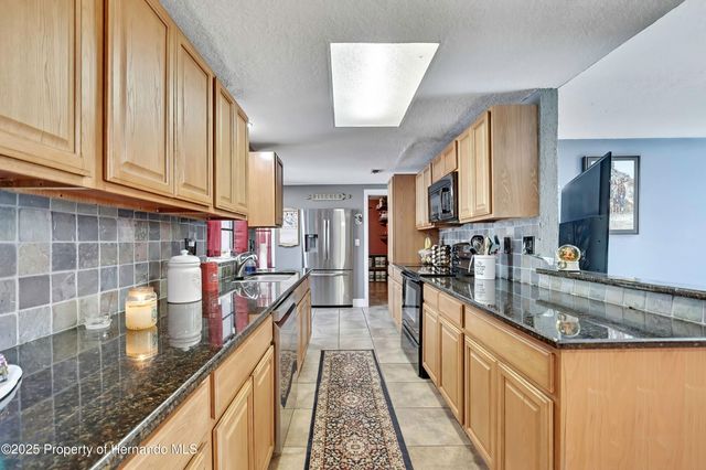 8265 Apple Orchard Road, Spring Hill, FL 34606