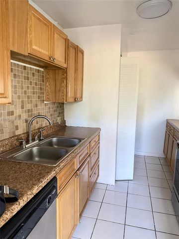 2035 NW 46th Ave D103, Lauderhill, FL 33313