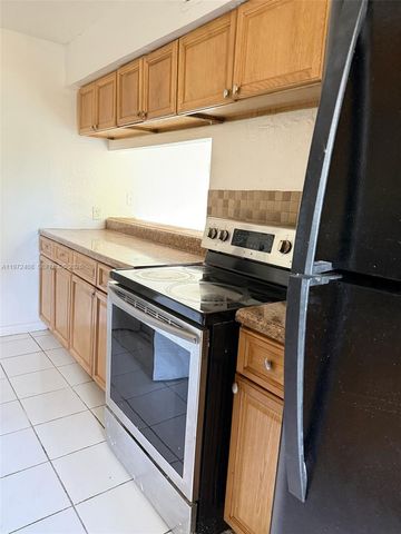 2035 NW 46th Ave D103, Lauderhill, FL 33313