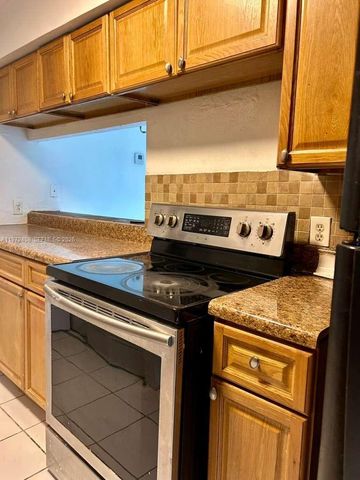 2035 NW 46th Ave D103, Lauderhill, FL 33313