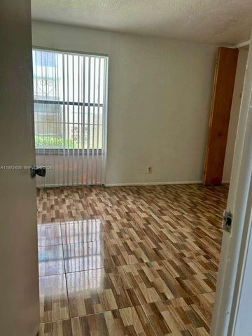 2035 NW 46th Ave D103, Lauderhill, FL 33313