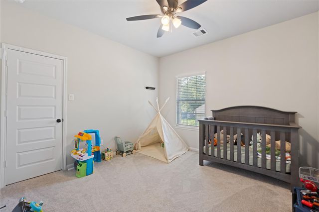303 Calmato Woods Way, Willis, TX 77318