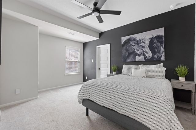 303 Calmato Woods Way, Willis, TX 77318