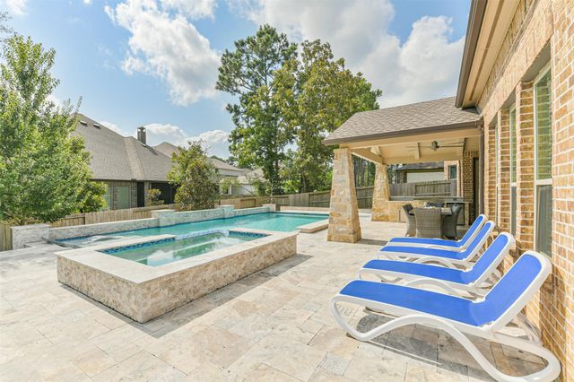 303 Calmato Woods Way, Willis, TX 77318