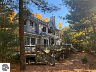 410 S Golden Beach Drive, Kewadin, MI 49648