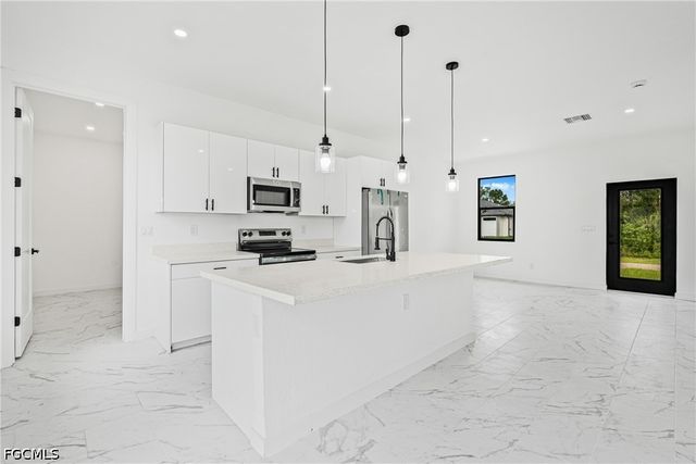 2807 6th ST SW, Lehigh Acres, FL 33976