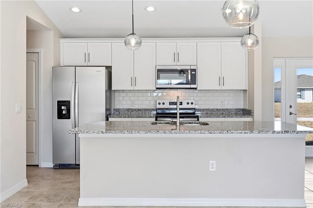 Image 8 of property listing at 536 NW 20th ST, Cape Coral, FL 33993