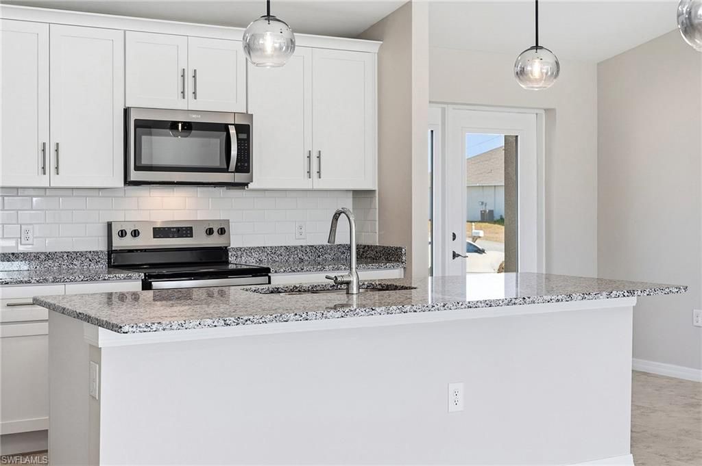 Image 9 of property listing at 536 NW 20th ST, Cape Coral, FL 33993