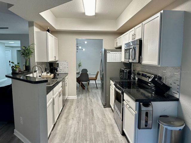 6440 AXEITOS TERRACE 106, Orlando, FL 32835